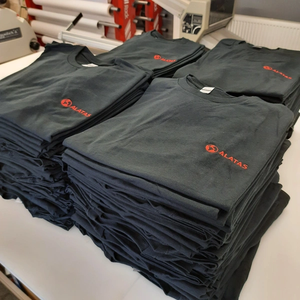  Piles Of Embroidered Garments