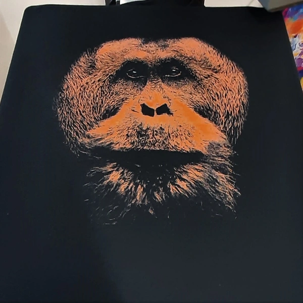 Orangetan printed using Dtg and made to look like screen print